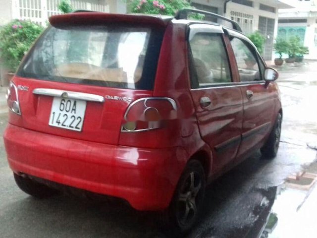 Cần bán xe Daewoo Matiz đời 2006, màu đỏ còn mới0