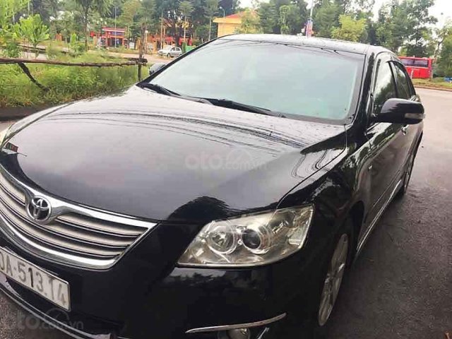 Cần bán xe Toyota Camry 2.4G đời 2007, màu đen, giá tốt0