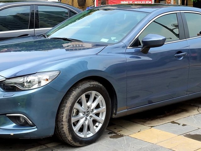 Cần bán lại xe Mazda 6 năm sản xuất 2015, màu xanh ngọc giá cạnh tranh0