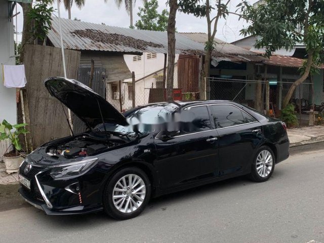 Cần bán lại xe Toyota Camry sản xuất 2015, màu đen0