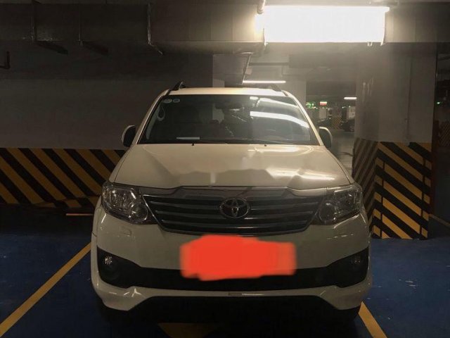 Bán ô tô Toyota Fortuner năm 2014, màu trắng chính chủ0