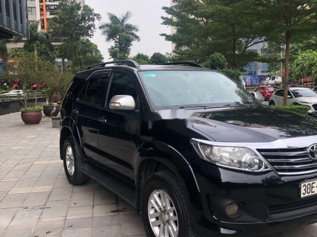 Chính chủ bán Toyota Fortuner 2013, màu đen0