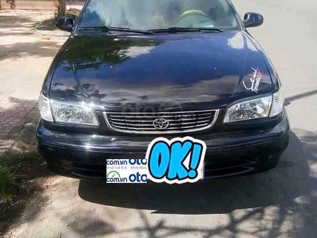 Bán Toyota Corolla năm 2001, màu đen, số sàn, 133 triệu