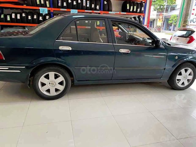 Cần bán lại xe Ford Laser năm sản xuất 2002, màu xanh lam còn mới, giá chỉ 115 triệu