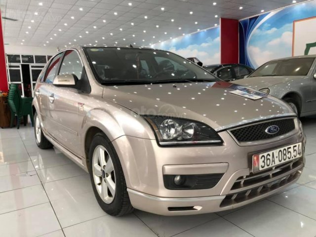 Cần bán Focus 2006 - ĐK 2007, máy số zin, đi 14.000km chuẩn, vàng cát0