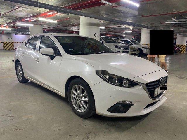 Cần bán xe Mazda 3 đời 2015, màu trắng chính chủ, giá tốt0