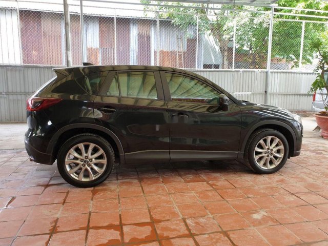 Cần bán lại xe Mazda CX 5 năm sản xuất 2015, màu đen, số tự động0