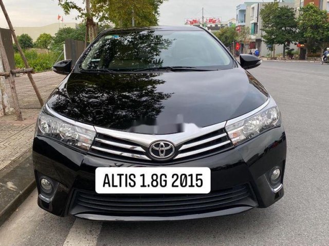 Bán Toyota Corolla Altis năm 2015, màu đen, giá chỉ 569 triệu0