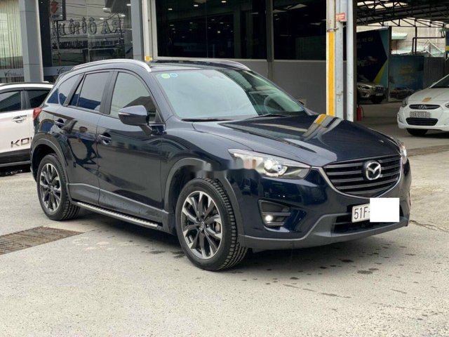 Cần bán lại xe Mazda CX 5 sản xuất năm 2016, màu xanh lam0