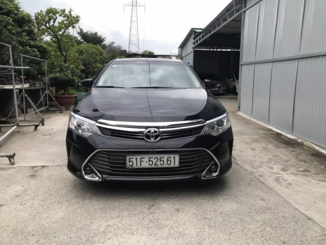 Bán xe Toyota Camry năm 2015, màu đen, giá thấp động cơ ổn định 