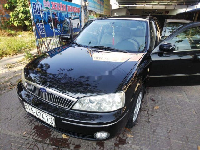 Bán ô tô Ford Laser sản xuất năm 2003, màu đen, bản đủ