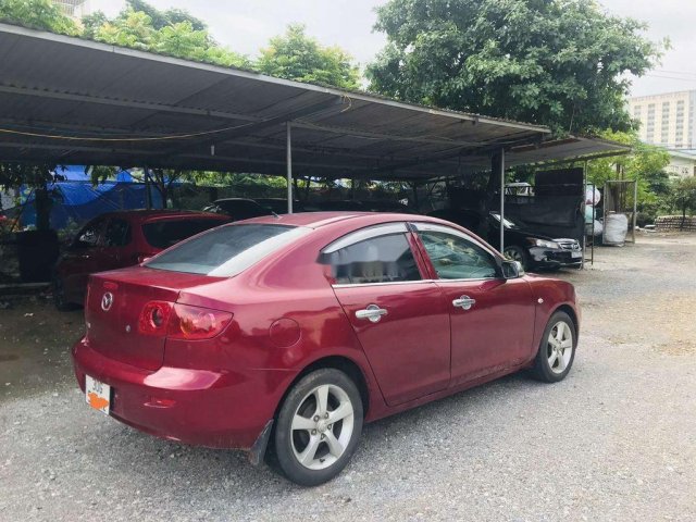 Gia đình bán lại xe Mazda 3 năm sản xuất 2004, màu đỏ. giá 195tr