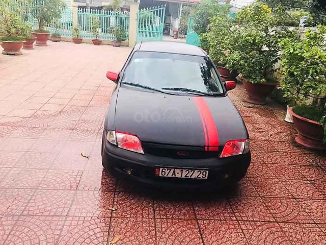 Bán Ford Laser Deluxe sản xuất năm 2001, màu đen xe gia đình, giá chỉ 139 triệu0