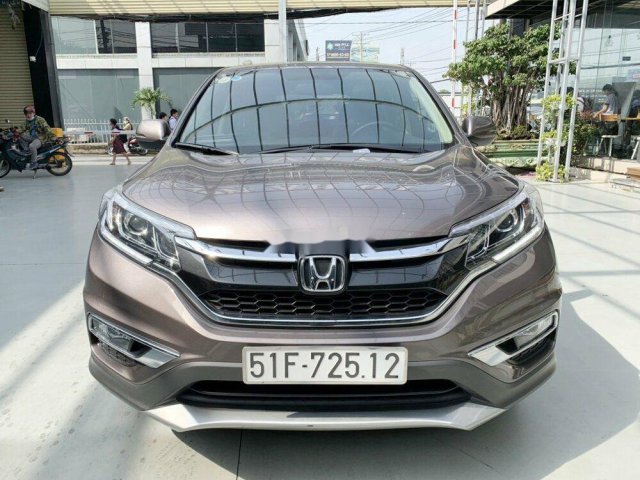 Cần bán xe Honda CR V 2.4AT sản xuất 2015, màu nâu xe gia đình0