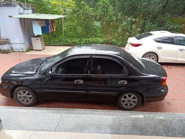 Bán Kia Spectra đời 2004, màu đen, nhập khẩu nguyên chiếc, 82 triệu