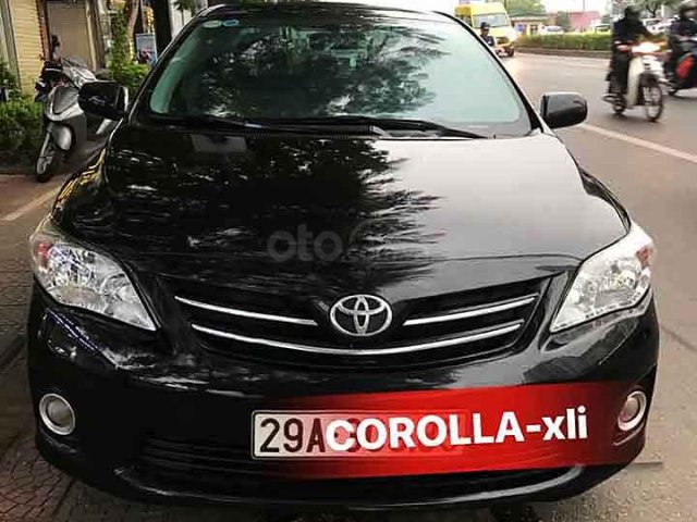 Bán xe Toyota Corolla sản xuất năm 2011, màu đen, xe nhập