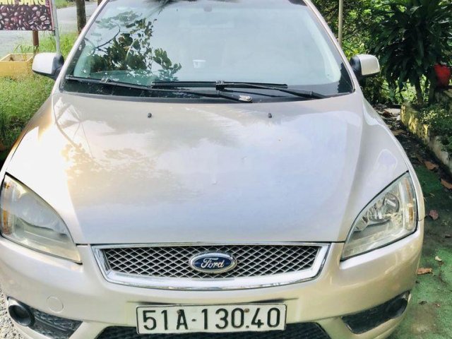 Bán xe Ford Focus năm 2009, màu vàng cát0