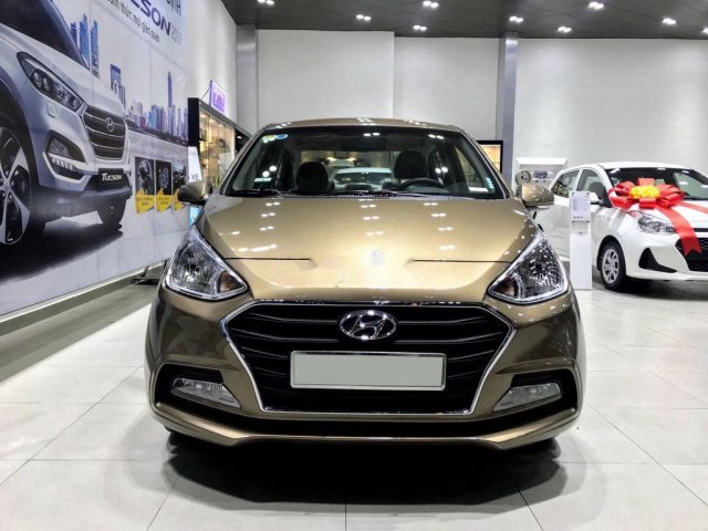 Cần bán Hyundai Grand i10 đời 2020, màu vàng cát