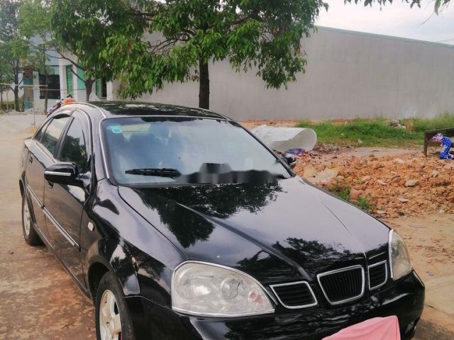 Bán Daewoo Lacetti năm 2004, màu đen xe gia đình, giá 105tr