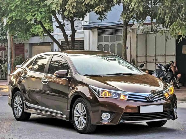 Cần bán gấp Toyota Corolla Altis sản xuất năm 2015, màu nâu còn mới