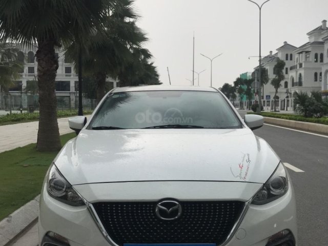 Cần bán lại chiếc Mazda 3 đời 2015, màu trắng, chính chủ sử dụng