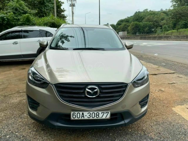 Mua xe giá thấp chiếc Mazda CX5 2.5 đời 2016, màu vàng cát, chính chủ sử dụng0