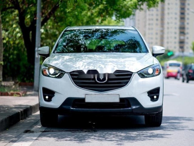 Cần bán xe Mazda CX 5 năm 2016, màu trắng, số tự động0