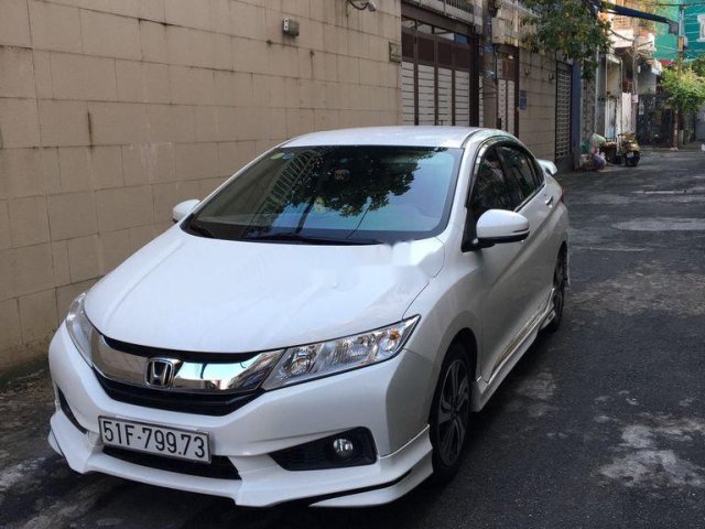 Cần bán gấp Honda City năm sản xuất 2016, màu trắng0