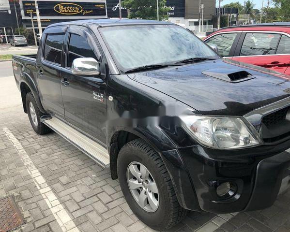 Bán Toyota Hilux năm sản xuất 2009, màu đen như mới