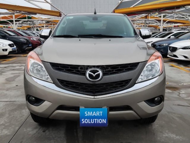 Bán xe Mazda BT 50 đời 2014, màu vàng, máy dầu0