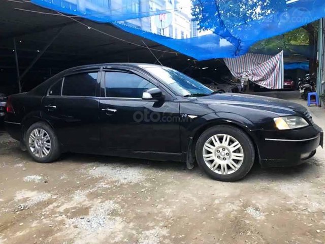 Cần bán lại xe Ford Mondeo 2004, màu đen số tự động0