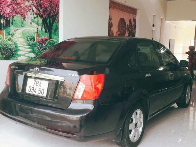 Cần bán lại xe Chevrolet Lacetti sản xuất 2004, màu đen, xe nhập0