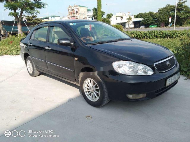 Bán xe Toyota Corolla Altis đời 2003, màu đen, 130 triệu0