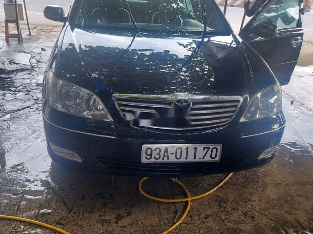 Bán xe Toyota Camry đời 2002, màu đen 