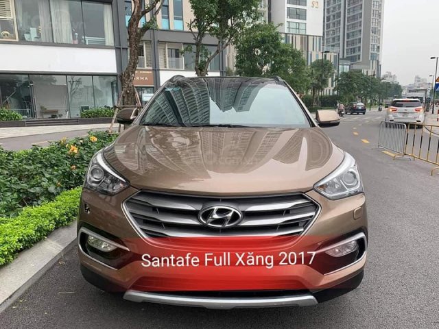 Chính chủ cần bán nhanh với giá ưu đãi nhất chiếc Hyundai Santa Fe máy xăng bản full màu vàng đồng