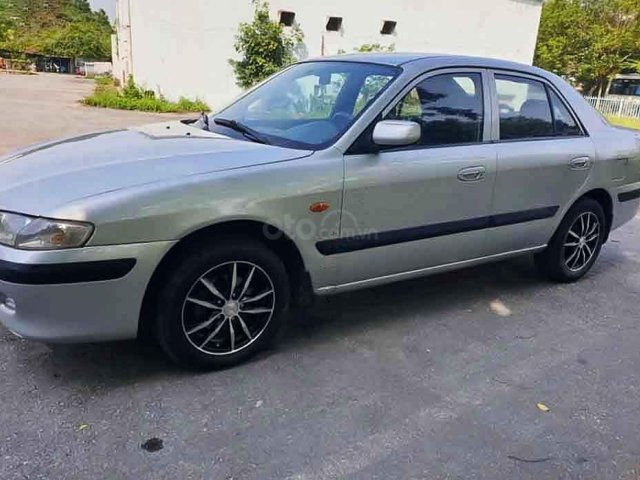 Cần bán Mazda 626 sản xuất 2002, màu bạc còn mới0