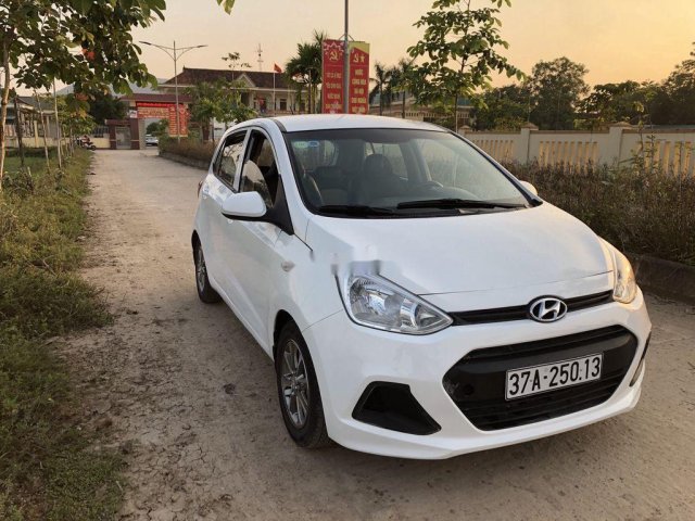 Cần bán lại xe Hyundai Grand i10 đời 2015, màu trắng, nhập khẩu số sàn0