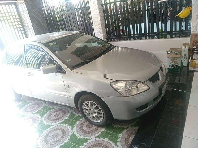 Bán Mitsubishi Lancer 2005, màu bạc xe gia đình