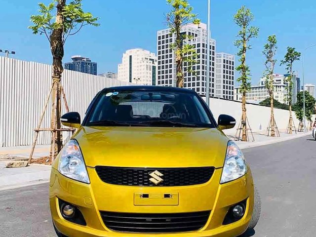 Cần bán gấp Suzuki Swift năm 2017, màu vàng, giá 435tr0