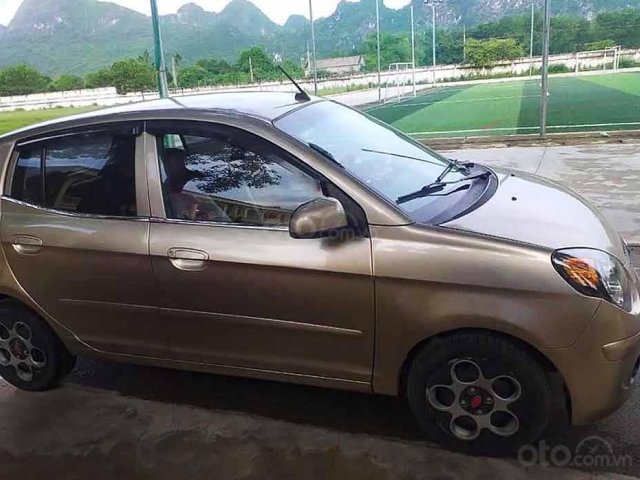 Cần bán xe Kia Morning LX 1.1 MT sản xuất năm 2011, màu vàng0