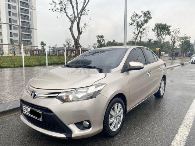 Bán Toyota Vios đời 2014, màu vàng cát0