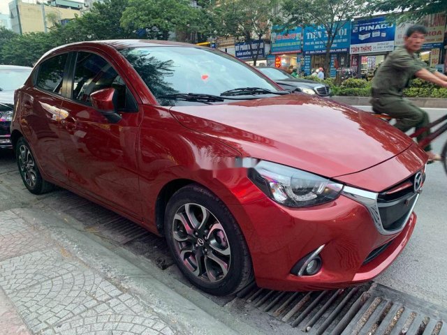 Cần bán Mazda 2 đời 2016, màu đỏ chính chủ0