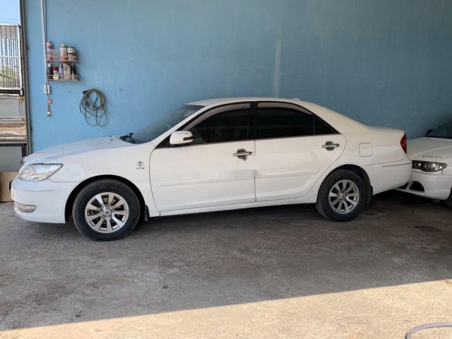 Bán Toyota Camry đời 2003, màu trắng số sàn, đủ đồ0