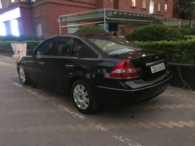 Cần bán lại xe Ford Mondeo đời 2003, màu đen, giá 130tr0