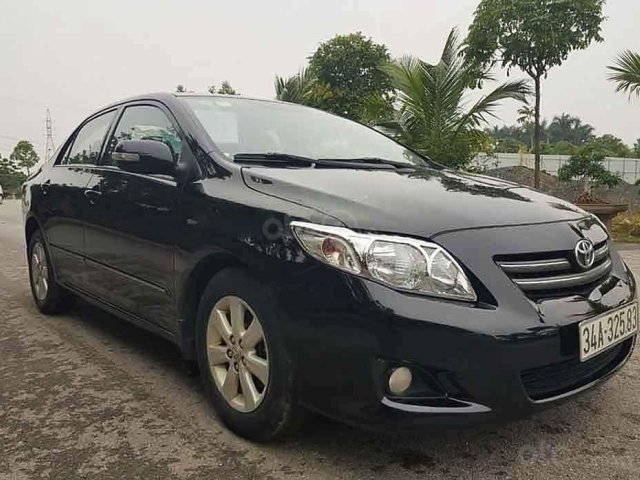 Cần bán lại xe Toyota Corolla Altis năm 2010, màu đen, số sàn0