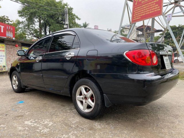 Bán Toyota Corolla Altis đời 2003, màu đen chính chủ 