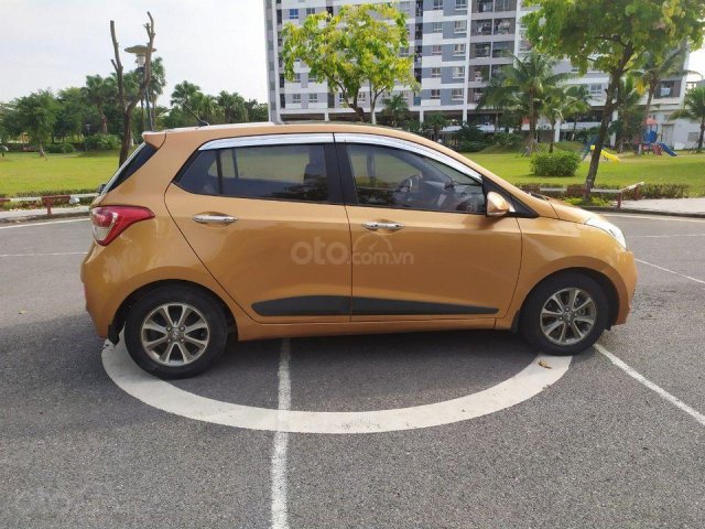 Bán xe Grand i10 hatchback 2015, màu cam