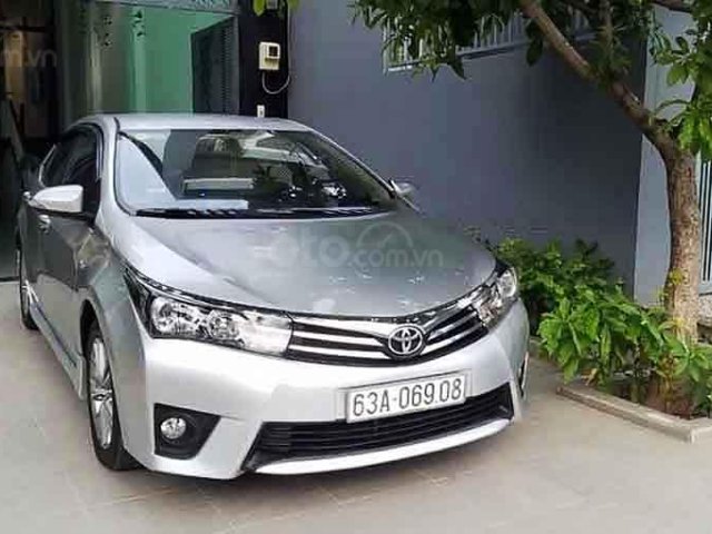 Cần bán lại xe Toyota Corolla Altis năm sản xuất 2015, màu bạc còn mới0