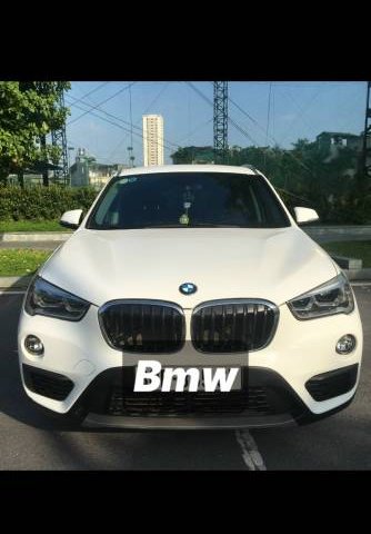 Cần bán xe BMW X1 đời 2015, màu trắng, nhập khẩu nguyên chiếc chính chủ