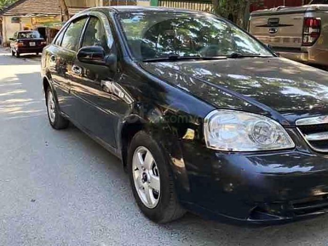 Cần bán gấp Daewoo Lacetti sản xuất 2009, màu đen0